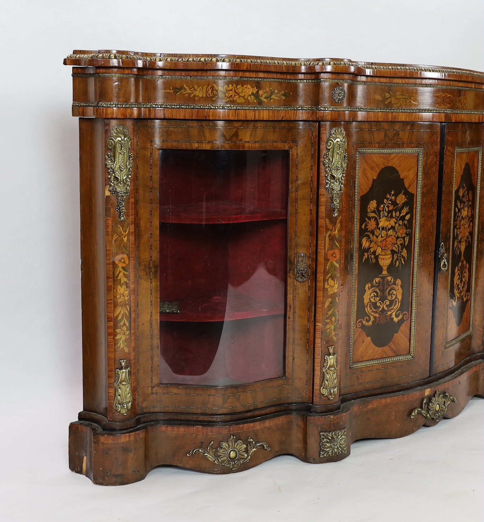 A Victorian marquetry inlaid walnut serpentine front credenza, W.200cm D.47cm H.110cm